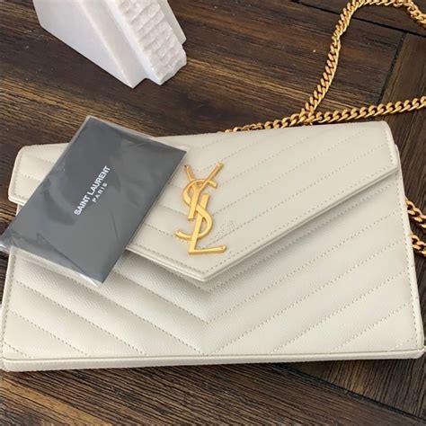 ysl white patent clutch|authentic ysl handbag clutch.